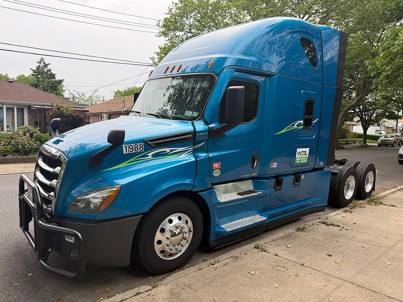 Blue Freightliner Cascadia semi tractor, illustrative reference photograph