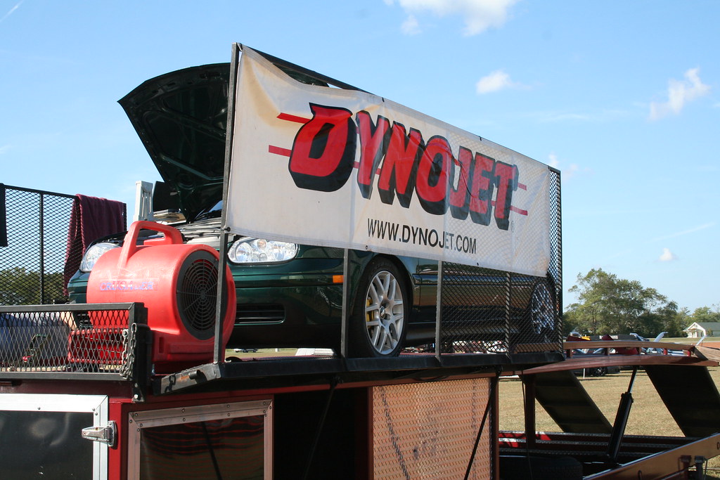 Dynojet branded mobile trailer dynamometer at an outdoor automotive event